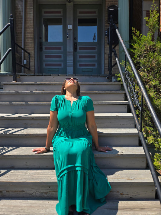 sitting on stoop looking up feeling the warmth of the sun